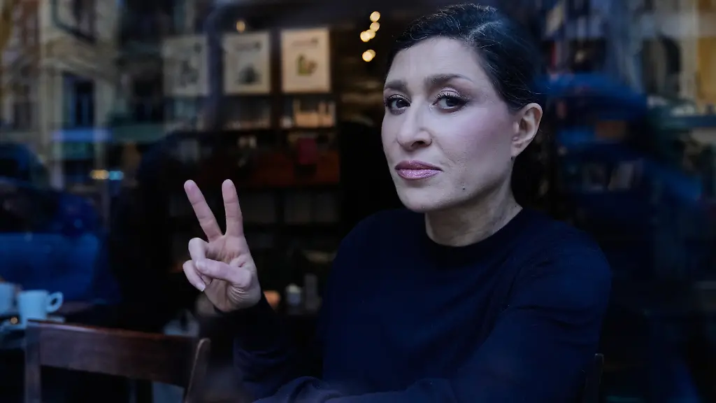 Iranian-Maral-Salmassi-poses-for-a-photo-before-an-interview-with-the-Associated-Press-in-her-cafe-in-Berlin-Germany-Thursday-Jan-15-2026