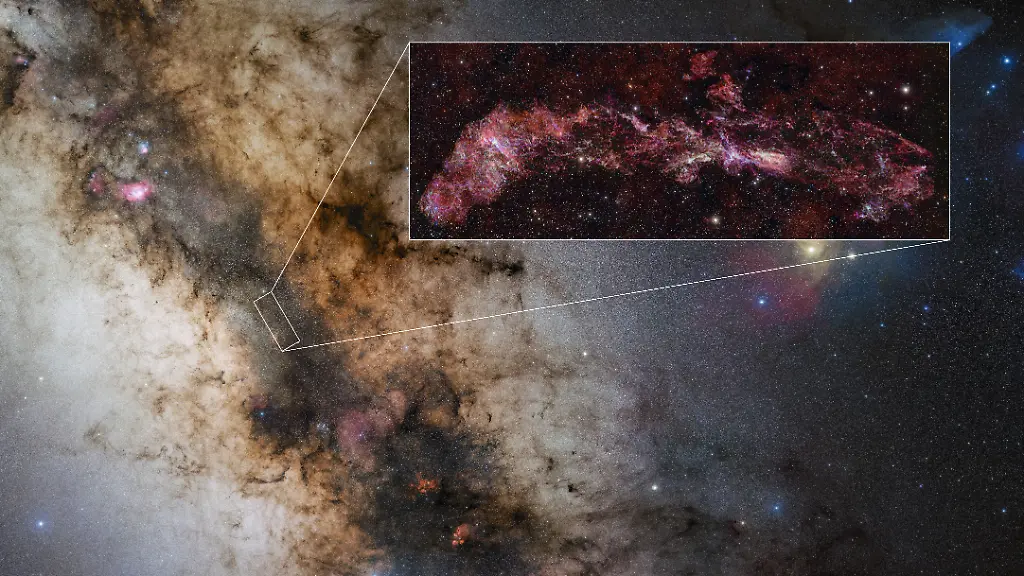 This-handout-image-mapped-with-the-Atacama-Large-Millimeter-submillimeter-Array-ALMA-and-released-by-European-Southern-Observatory-ESO-on-February-26-2026-shows-the-location-of-the-Central-Molecular-Zone-CMZ-a-region-at-the-core-of-our-galaxy-rich-in-dense-and-intricate-gas-clouds-Scientists-have-been-able-to-observe-the-central-region-of-the-Milky-Way-in-detail-for-the-first-time-where-star-formation-could-provide-keys-to-understanding-the-origins-of-the-universe-This-zone-has-been-as-part-of-the-ALMA-CMZ-Exploration-Survey-or-ACES-and-the-inset-is-an-ACES-image-where-different-molecules-are-displayed-in-different-colours-The-entire-image-the-largest-ever-made-with-ALMA-is-as-long-as-three-full-Moons-side-by-side-in-the-sky