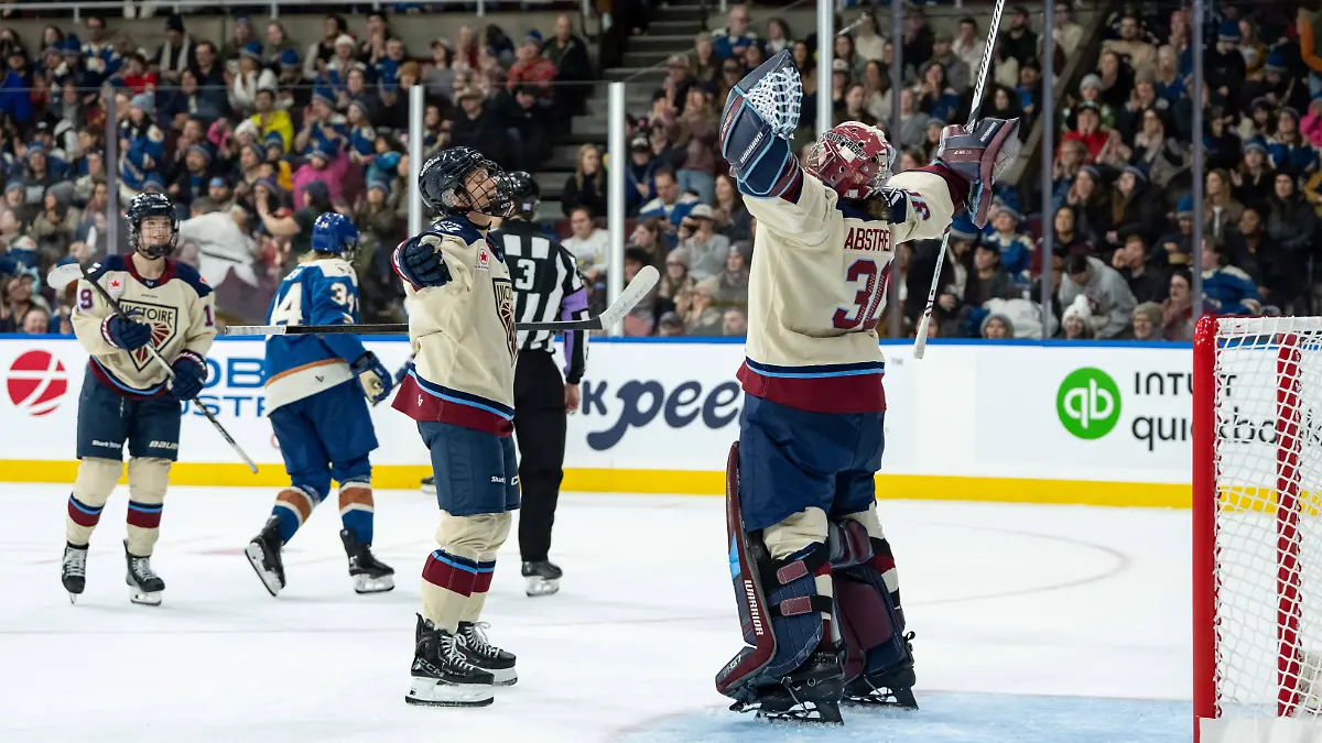 December-20-2025-Vancouver-Bc-CANADA-Montreal-Victoire-s-Kati-Tabin-9-and-Montreal-Victoire-goaltender-Sandra-Abstreiter-30-celebrate-after-defeating-the-Vancouver-Goldeneyes-during-the-third-period-of-a-PWHL-hockey-game-in-Vancouver-B-C-Saturday-Dec-20-2025