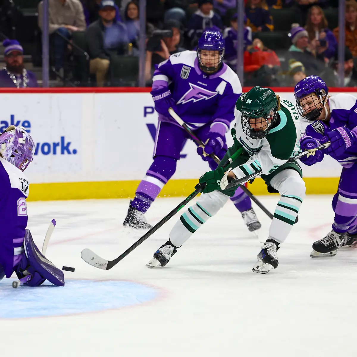 December-19-2025-Minneapolis-Minnesota-United-States-Boston-player-LAURA-KLUGE-sends-a-shot-towards-Minnesota-Frost-goaltender-NICOLE-HENSLEY-29-The-Minnesota-Frost-and-Boston-Fleet-faced-off-for-a-regular-season-matchup-on-December-19th-at-Grand-Casino-Arena-The-Minnesota-Frost-were-victorious-winning-5-2