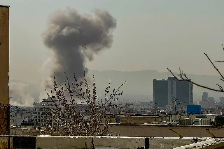 Israel-Attack-Iran-February-28-A-plume-of-smoke-rises-over-Tehran-after-a-reported-explosion-on-February-28-2026-after-Israel-said-it-carried-out-a-preemptive-strike-on-Iran-as-sirens-sounded-in-Jerusalem-and-phone-alerts-warned-of-an-extremely-serious-threat