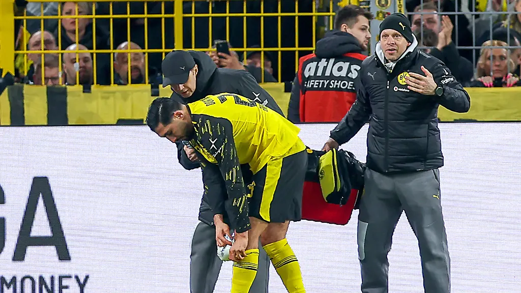 28-02-2026-Fussball-Borussia-Dortmund-FC-Bayern-Muenchen-1-Fussball-Bundesliga-24-Spieltag-Signal-Iduna-Park-Saison-2025-2026-Emre-Can-BVB-23-muss-verletzt-das-Spielfeld-verlassen-und-hat-Schmerzen-im-Knie-DFB-regulations-prohibit-any-use-of-photographs-as-image-sequences-and-or-quasi-video