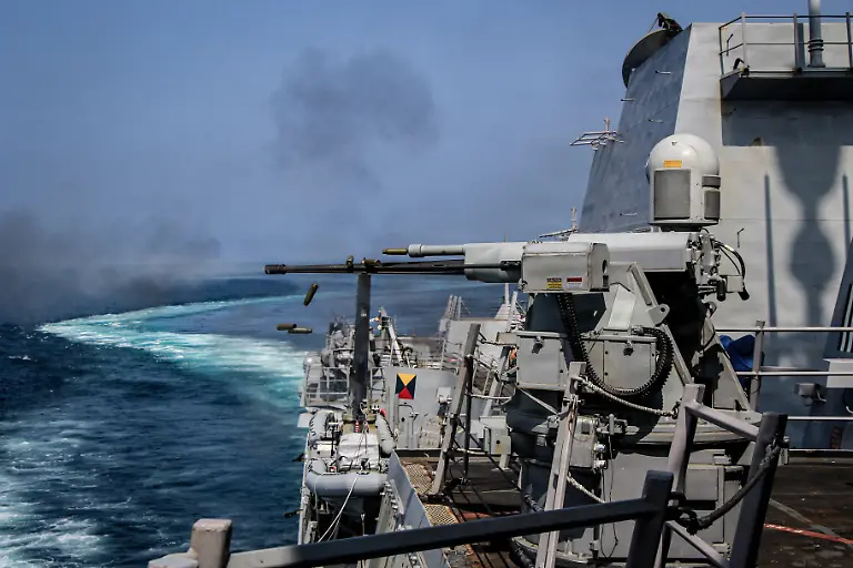 ARABIAN-SEA-FEBRUARY-27-EDITORIAL-USE-ONLY-MANDATORY-CREDIT-US-CENTCOM-HANDOUT-NO-MARKETING-NO-ADVERTISING-CAMPAIGNS-DISTRIBUTED-AS-A-SERVICE-TO-CLIENTS-The-United-States-Navy-destroyer-USS-Frank-E-Petersen-Jr-DDG-121-conducted-a-live-fire-military-exercise-in-the-Arabian-Sea-on-February-27-2026