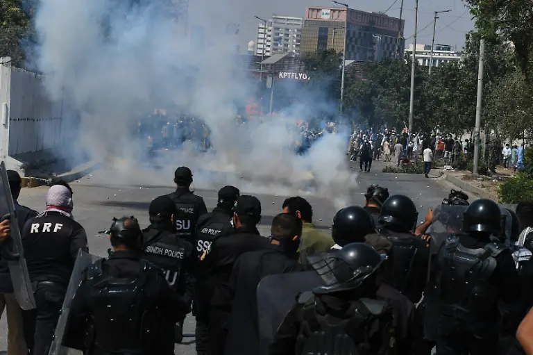 Police-officers-fire-tear-gas-shell-to-disperse-Shiite-Muslims-during-a-protest-to-condemn-the-killing-of-Iranian-Supreme-Leader-Ayatollah-Ali-Khamenei-in-Karachi-Pakistan-Sunday-March-1-2026