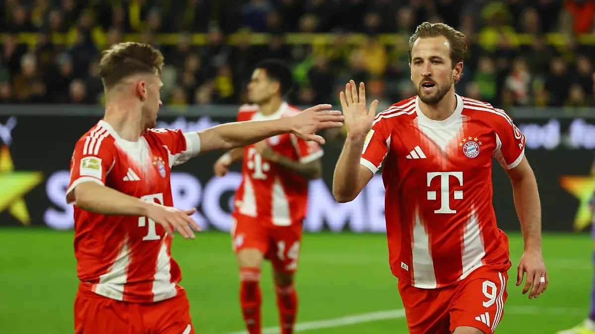 Soccer-Football-Bundesliga-Borussia-Dortmund-v-Bayern-Munich-Signal-Iduna-Park-Dortmund-Germany-February-28-2026-Bayern-Munich-s-Harry-Kane-celebrates-scoring-their-second-goal-with-Joshua-Kimmich-REUTERS-Wolfgang-Rattay-DFL-REGULATIONS-PROHIBIT-ANY-USE-OF-PHOTOGRAPHS-AS-IMAGE-SEQUENCES-AND-OR-QUASI-VIDEO
