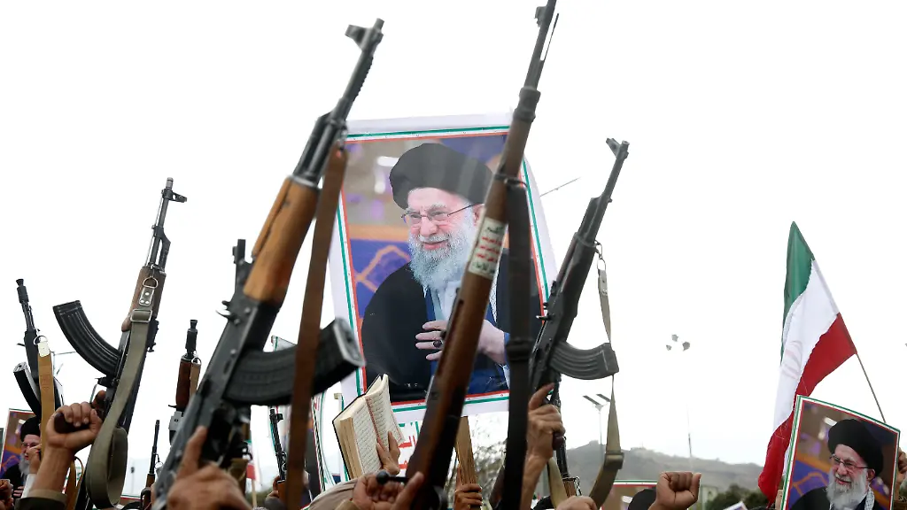 SANA-A-YEMEN-MARCH-01-Pro-Iran-protesters-brandish-billboards-depicting-the-Iranian-Supreme-Leader-Ali-Hosseini-Khamenei-flags-of-Yemen-and-Iran-weapons-and-chant-slogans-as-they-take-part-in-a-rally-held-to-condemn-the-US-Israel-aerial-attacks-on-Iran-and-killing-the-Iranian-Supreme-leader-and-several-military-officials-on-March-1-2026-in-Sana-a-Yemen