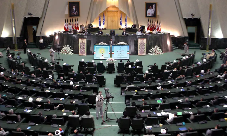 Mahmoud-Ahmadinejad-C-delivers-his-speech-during-the-swearing-in-ceremony-in-the-Iranian-Parliament-on-Saturday-06-August-2005-Mahmoud-Ahmadinejad-was-sworn-in-Saturday-as-Iran-s-new-president-following-the-hard-line-conservative-s-landslide-victory-in-June-The-swearing-in-ceremony-in-parliament-formally-makes-Ahmadinejad-48-the-successor-of-reformist-Mohammad-Khatami