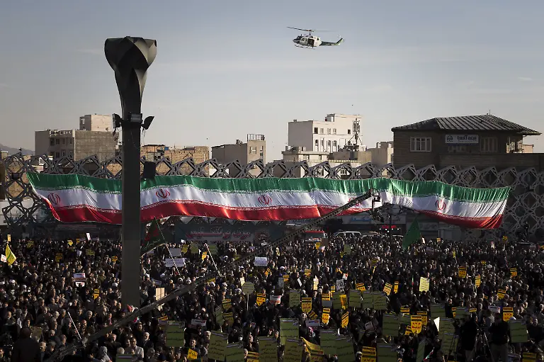 December-30-2019-Tehran-Iran-Iranians-attend-a-gathering-to-mark-the-Aepic-of-Dey-9A-at-Imam-Hossein-Square-in-downtown-Tehran-Iran-On-December-30-2009-pro-government-rallies-also-known-as-the-Dey-9-epic-took-place-in-various-Iranian-cities-including-Tehran-Shiraz-Arak-Qom-and-Isfahan-The-rallies-were-held-in-response-to-the-Ashura-protests-where-protesters-on-that-day-did-acts-including-applauding-whistling-and-engaging-in-other-cheerful-displays-which-was-viewed-as-a-violation-of-a-red-line-and-targeting-Husayn-ibn-Ali-and-Ashura-commemoration-itself-The-demonstrations-and-counter-demonstrations-were-connected-to-the-disputed-2009-Iranian-presidential-election