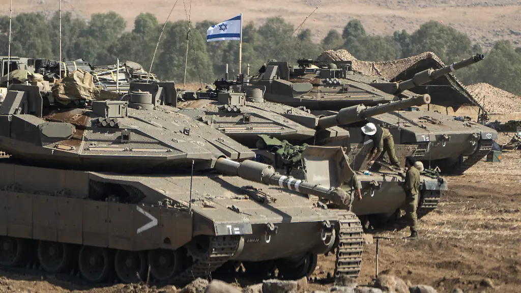 Israeli-tanks-are-stationed-near-the-border-with-Lebanon-in-Israel-Saturday-Oct-14-2023