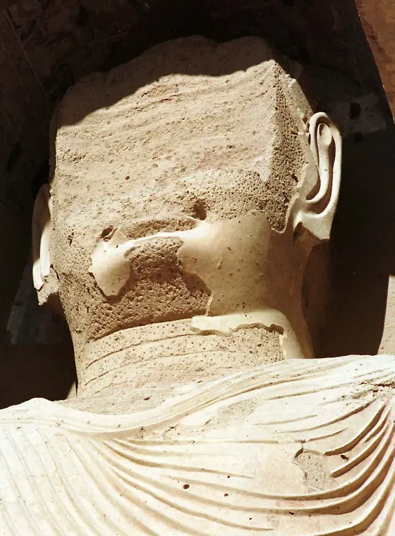 The-damaged-face-of-a-55-meter-high-Buddha-statue-is-seen-in-this-picture-taken-in-Bamiyan-central-Afghanistan-The-last-archealogical-and-repair-work-was-carried-out-in-the-late-1970-s-but-now-most-of-the-drains-for-protecting-the-Buddhas-from-floods-rains-and-snow-are-damaged-threatening-the-1-800-years-old-statues-Picture-taken-December-18-1997