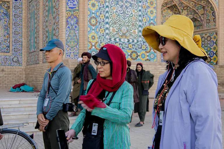 A-gathering-of-locals-and-visitors-outside-a-historical-mosque-in-Herat-Afghanistan-on-May-17-2024-Herat-the-third-largest-city-in-Afghanistan-is-an-oasis-in-the-fertile-Hari-River-valley-south-of-the-Paropamisus-Mountains-As-the-capital-of-Herat-Province-it-had-an-estimated-population-of-574-276-in-2020-and-serves-as-a-key-cultural-and-historical-center-in-western-Afghanistan