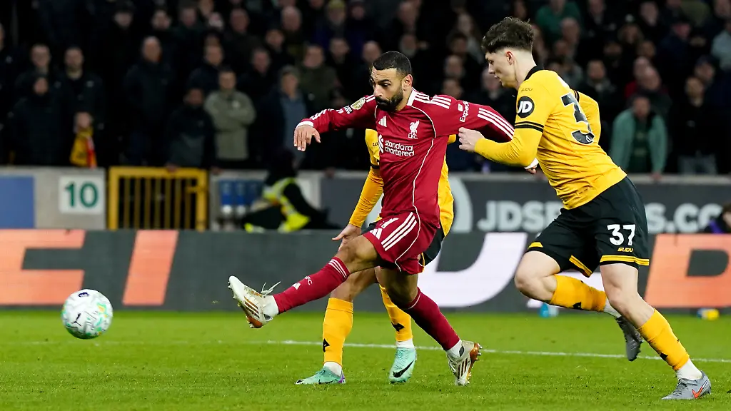 Wolverhampton-Wanderers-v-Liverpool-Premier-League-Molineux-Liverpool-s-Mohamed-Salah-scores-their-side-s-first-goal-of-the-game-during-the-Premier-League-match-at-Molineux-Wolverhampton-Picture-date-Tuesday-March-3-2026-Photo-credit-should-read-Jacob-King-PA-Wire-RESTRICTIONS-EDITORIAL-USE-ONLY-No-use-with-unauthorised-audio-video-data-fixture-lists-club-league-logos-or-live-services-Online-in-match-use-limited-to-120-images-no-video-emulation-No-use-in-betting-games-or-single-club-league-player-publications
