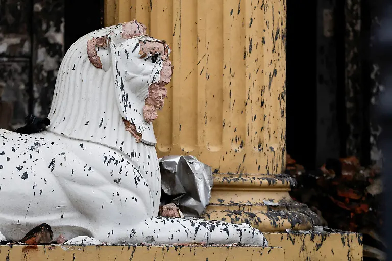 A-damaged-statue-of-a-lion-stands-at-the-entrance-of-the-presidential-building-Sheetal-Niwas-which-was-ransacked-and-burned-by-protesters-after-youth-led-protests-that-toppled-Nepal-s-prime-minister-during-the-oath-of-office-ceremony-for-three-new-ministers-in-Kathmandu-Nepal-September-15-2025-77-people-were-killed-in-two-days-of-protests-that-later-forced-the-resignation-of-then-Prime-Minister-K-P-Sharma-Oli-and-shook-up-Nepal-s-broken-political-system-A-state-appointed-commission-charged-with-conducting-an-investigation-into-the-protests-including-the-use-of-live-ammunition-against-young-demonstrators-has-received-three-extensions-to-complete-the-probe-Its-final-findings-are-expected-to-be-released-after-the-general-election-set-for-March-5-2026-REUTERS-Navesh-Chitrakar-SEARCH-CHITRAKAR-NEPAL-PROTESTER-FAMILIES-FOR-THIS-STORY-SEARCH-WIDER-IMAGE-FOR-ALL-STORIES