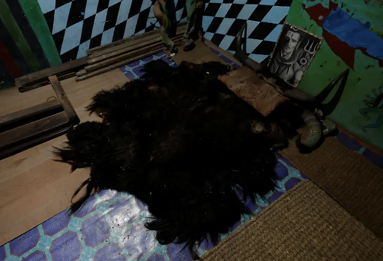 A-yak-hide-on-which-Binod-Maharjan-34-who-was-shot-dead-during-youth-led-protests-that-toppled-Nepal-s-prime-minister-and-prompted-elections-set-for-March-5-2026-slept-with-horns-at-the-edge-of-his-pillow-next-to-a-wall-bearing-a-depiction-of-Shiva-the-Hindu-deity-he-worshipped-inside-his-room-in-Lalitpur-Nepal-February-20-2026-After-feeding-pigeons-on-the-terrace-like-he-did-most-mornings-Binod-abruptly-left-home-on-September-8-leaving-his-breakfast-of-rice-and-lentils-The-family-only-discovered-he-had-joined-the-swelling-protests-after-Binod-s-elder-brother-received-a-phone-call-from-one-of-his-sibling-s-childhood-friends-and-rushed-to-Kathmandu-s-Everest-Hospital-My-son-said-he-would-return-home-and-eat-the-meal-he-had-left-behind-said-Lata-Maya-He-never-came-back-REUTERS-Navesh-Chitrakar-SEARCH-CHITRAKAR-NEPAL-PROTESTER-FAMILIES-FOR-THIS-STORY-SEARCH-WIDER-IMAGE-FOR-ALL-STORIES