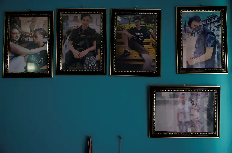 Portraits-of-Rashik-Khatiwada-23-who-was-shot-dead-during-youth-led-protests-that-toppled-Nepal-s-prime-minister-and-prompted-elections-set-for-March-5-2026-hang-on-the-wall-of-his-room-in-Kathmandu-Nepal-February-23-2026-After-years-of-being-largely-indifferent-to-politics-Khatiwada-joined-the-Rastriya-Swatantra-Party-stating-her-decision-was-driven-by-a-motivation-to-seek-justice-for-her-son-and-families-of-others-killed-in-the-protests-What-have-past-leaders-done-for-this-country-over-the-last-three-decades-They-accumulated-wealth-for-themselves-and-placed-their-own-people-in-positions-of-power-to-benefit-from-it-Khatiwada-said-What-did-they-truly-do-for-the-nation-REUTERS-Navesh-Chitrakar-SEARCH-CHITRAKAR-NEPAL-PROTESTER-FAMILIES-FOR-THIS-STORY-SEARCH-WIDER-IMAGE-FOR-ALL-STORIES