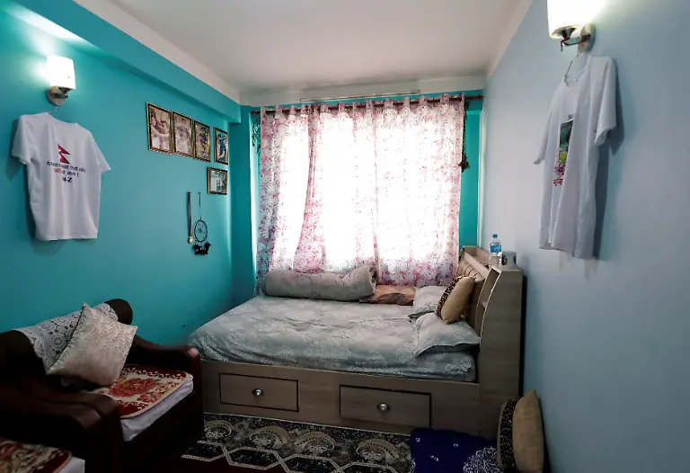 The-room-of-Rashik-Khatiwada-23-who-was-shot-dead-during-youth-led-protests-that-toppled-Nepal-s-prime-minister-and-prompted-elections-set-for-March-5-2026-is-seen-in-Kathmandu-Nepal-February-23-2026-After-years-of-being-largely-indifferent-to-politics-Khatiwada-joined-the-Rastriya-Swatantra-Party-stating-her-decision-was-driven-by-a-motivation-to-seek-justice-for-her-son-and-families-of-others-killed-in-the-protests-What-have-past-leaders-done-for-this-country-over-the-last-three-decades-They-accumulated-wealth-for-themselves-and-placed-their-own-people-in-positions-of-power-to-benefit-from-it-Khatiwada-said-What-did-they-truly-do-for-the-nation-REUTERS-Navesh-Chitrakar-SEARCH-CHITRAKAR-NEPAL-PROTESTER-FAMILIES-FOR-THIS-STORY-SEARCH-WIDER-IMAGE-FOR-ALL-STORIES