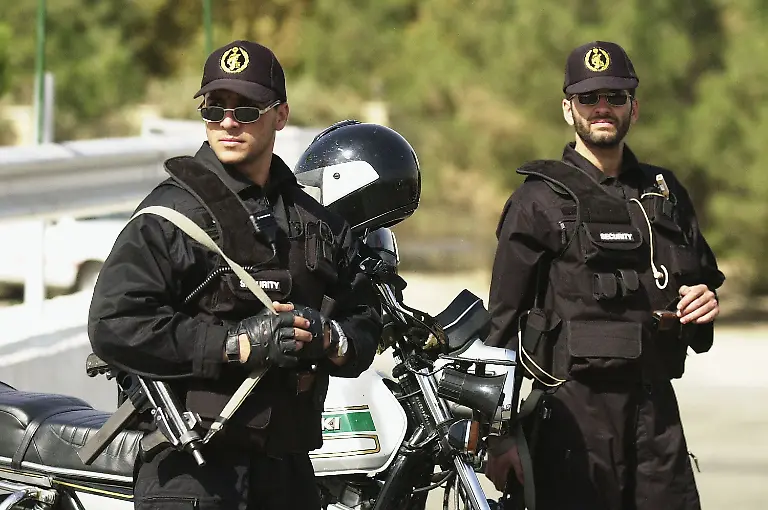 TEHRAN-IRAN-SEPTEMBER-22-Iranian-military-forces-launch-Sacred-Defense-Week-with-a-show-of-force-south-of-Tehran-on-September-22-2003-in-Tehran-Iran-President-Mohammad-Khatami-and-Iranian-military-leaders-reviewed-thousands-of-regular-troops-basiji-militia-and-black-clad-riot-police-as-well-as-tanks-artillery-rockets-and-the-Shahab-3-ballistic-missile-Washington-considers-Iran-part-of-its-axis-of-evil-and-accuses-Tehran-of-harbouring-Al-Qaeda-chiefs-and-of-aiming-for-a-nuclear-arsenal