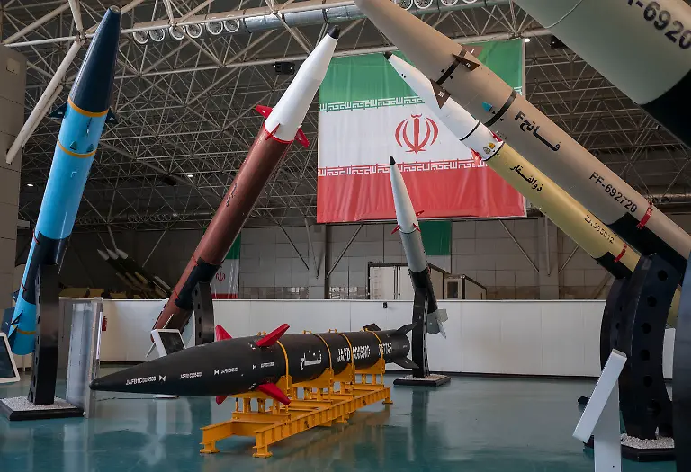 Fattah-Iran-s-first-ever-hypersonic-missile-is-placed-next-to-Iranian-surface-to-surface-missiles-at-the-Islamic-Revolutionary-Guard-Corps-IRGC-National-Aerospace-Park-in-western-Tehran-October-11-2023-The-IRGC-National-Aerospace-Park-showcasing-the-achievements-of-the-IRGC-Aerospace-Force-was-inaugurated-on-September-27-2020-by-IRGC-Commander-in-Chief-Major-General-Hossein-Salami-and-IRGC-Aerospace-Force-Brigadier-General-Amir-Ali-Hajizadeh-In-February-the-IRGC-Aerospace-Force-commander-announced-Iran-s-expertise-in-guiding-solid-propellant-missiles-beyond-the-Earth-s-atmosphere