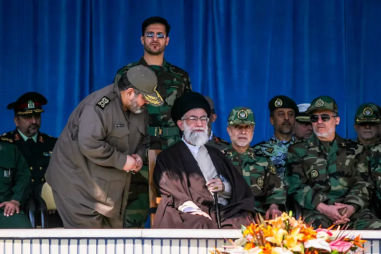 Iran-Air-Force-Graduation-Ceremony-A-senior-Iranian-military-official-approaches-Irans-Supreme-Leader-Ayatollah-Ali-Khamenei-during-a-graduation-ceremony-at-Shahid-Sattari-Air-Force-Academy-in-Tehran-Iran-on-October-24-2007-The-ceremony-marks-the-commissioning-of-new-officers-from-Irans-air-force-academies-in-the-presence-of-senior-military-commanders