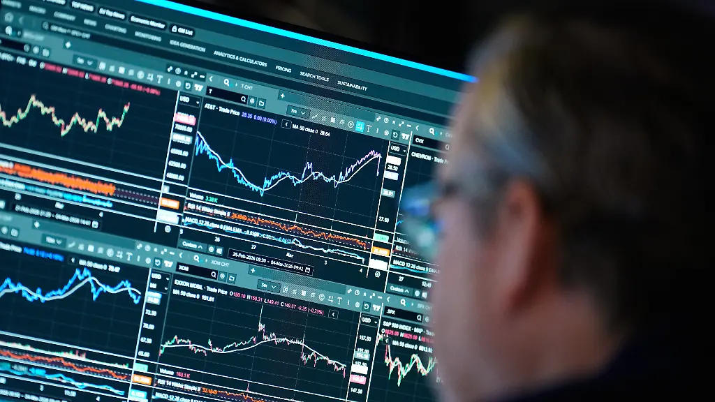 Financial-information-is-displayed-on-the-floor-at-the-New-York-Stock-Exchange-in-New-York-Wednesday-March-4-2026