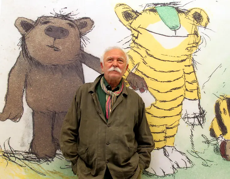 ARCHIV-Illustrator-und-Geschichtenerzaehler-Janosch-posiert-am-25-09-2010-in-der-Ludwig-Galerie-Schloss-Oberhausen-vor-seinem-Bild-Der-Tiger-mit-gruener-Nase-2005-Der-Kuenstler-Janosch-braucht-viel-Sonne-um-arbeiten-zu-koennen-ACHTUNG-Dieses-Bild-hat-dpa-auch-im-Bildfunk-gesendet