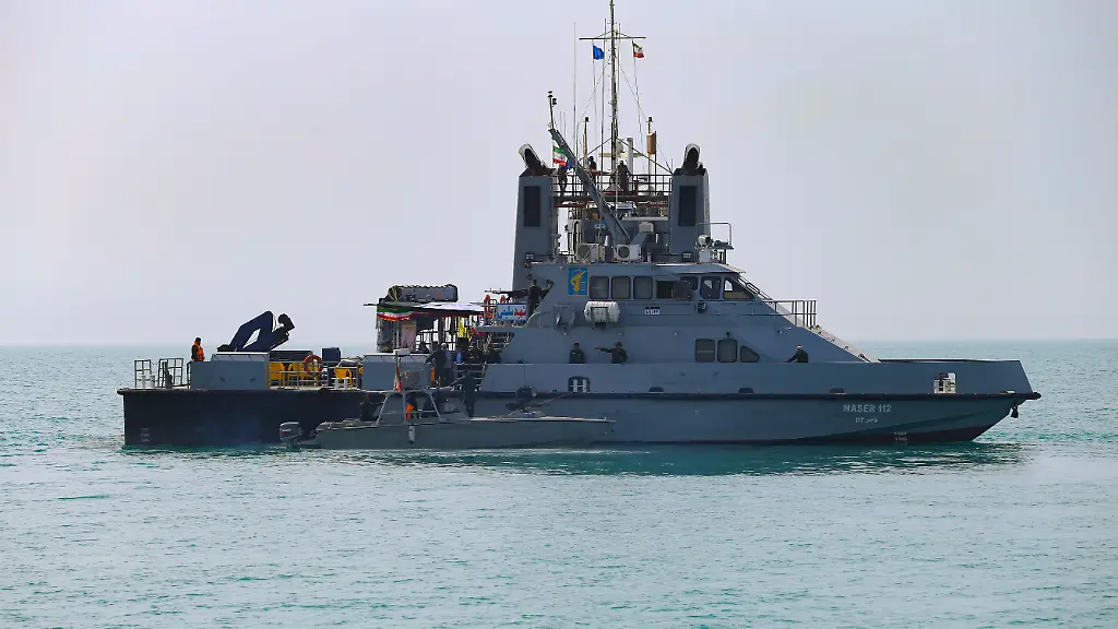 April-29-2024-Persian-Gulf-Bushehr-Iran-IRIS-112-Shahid-martyr-Salimi-warship-of-the-Islamic-Revolutionary-Guard-Corps-IRGC-is-sailing-along-the-Persian-Gulf-during-the-IRGC-marine-parade-to-commemorate-Persian-Gulf-National-Day-near-the-Bushehr-nuclear-power-plant-in-the-seaport-city-of-Bushehr-Bushehr-province-southern-Iran-Iran-celebrates-the-anniversary-of-the-liberation-of-the-country-s-south-from-Portuguese-occupation-in-1622-as-Persian-Gulf-National-Day-in-Bushehr-on-April-29-2024-The-date-coincides-with-the-anniversary-of-a-successful-military-campaign-by-Shah-Abbas-the-Great-of-Persia-in-the-17th-century-This-campaign-drove-the-Portuguese-navy-out-of-Hormuz-Island-after-which-it-was-named-the-waterway-that-separated-the-Gulf-from-the-Sea-of-Oman