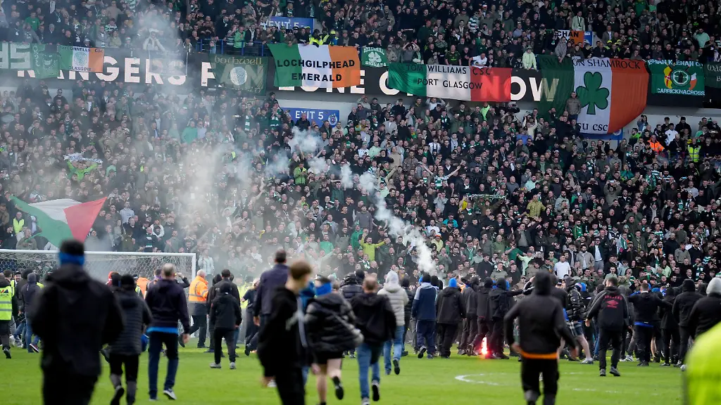 Rangers-v-Celtic-Scottish-Gas-Men-s-Scottish-Cup-Quarter-Final-Ibrox-Stadium-Pitch-invasion-after-Celtic-win-on-penalties-after-the-Scottish-Gas-Men-s-Scottish-Cup-quarter-final-match-at-Ibrox-Stadium-Glasgow-Picture-date-Sunday-March-8-2026-Photo-credit-should-read-Andrew-Milligan-PA-Wire-RESTRICTIONS-EDITORIAL-USE-ONLY-No-use-with-unauthorised-audio-video-data-fixture-lists-club-league-logos-or-live-services-Online-in-match-use-limited-to-120-images-no-video-emulation-No-use-in-betting-games-or-single-club-league-player-publications