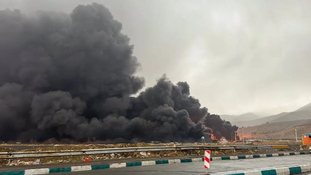 Smoke-and-flames-rise-at-the-site-of-airstrikes-on-an-oil-depot-in-Tehran-on-March-8-2026-The-United-States-and-Israel-launched-strikes-against-Iran-on-February-28-prompting-Iranian-retaliation-with-missile-attacks-across-the-region-and-intensifying-concerns-about-disruption-to-global-energy-and-transport