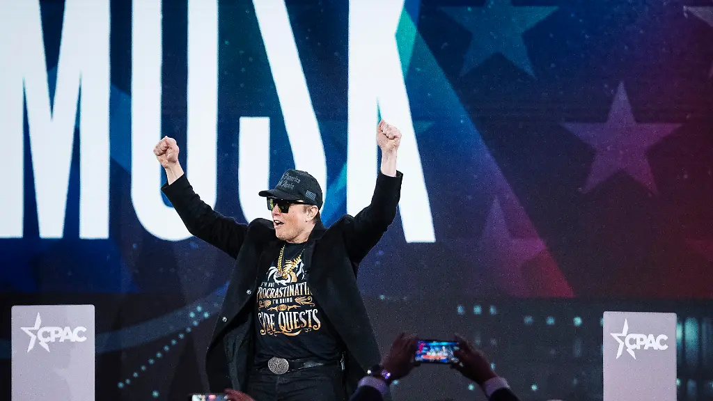 Elon-Musk-arrives-on-stage-before-speaking-during-day-1-of-the-2025-Conservative-Political-Action-Conference-at-the-Gaylord-National-Resort-Convention-Center-in-Oxon-Hill-Maryland-on-Thursday-February-20-2025