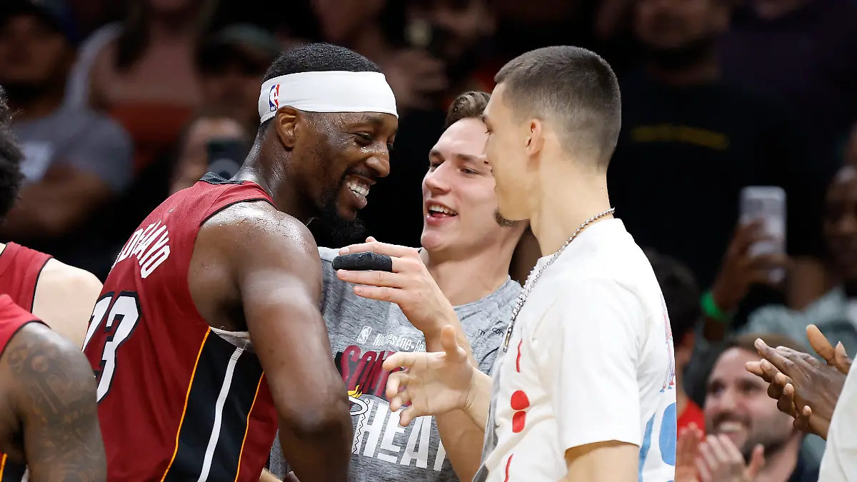 Mar-10-2026-Miami-Florida-USA-Miami-Heat-center-Bam-Adebayo-13-celebrates-with-guards-Pelle-Larsson-and-Tyler-Herro-after-becoming-the-NBA-s-second-highest-scorer-of-points-in-a-game-against-the-Wshington-Wizards-at-Kaseya-Center