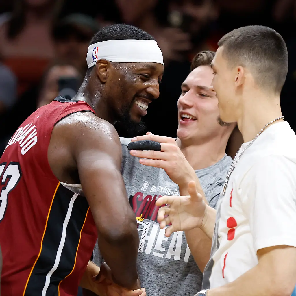 Mar-10-2026-Miami-Florida-USA-Miami-Heat-center-Bam-Adebayo-13-celebrates-with-guards-Pelle-Larsson-and-Tyler-Herro-after-becoming-the-NBA-s-second-highest-scorer-of-points-in-a-game-against-the-Wshington-Wizards-at-Kaseya-Center