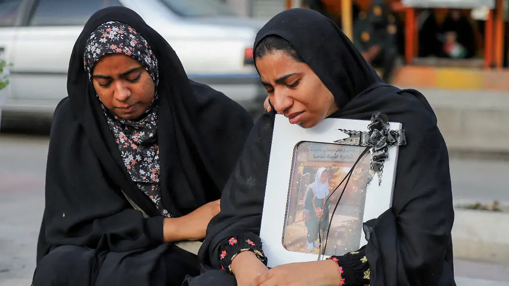 FILE-PHOTO-People-mourn-on-the-day-of-the-funeral-of-the-victims-following-a-reported-strike-on-a-school-in-Minab-Iran-March-3-2026-Amirhossein-Khorgooei-ISNA-WANA-West-Asia-News-Agency-via-REUTERS-ATTENTION-EDITORS-THIS-PICTURE-WAS-PROVIDED-BY-A-THIRD-PARTY