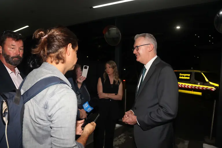 Sydney-AUSTRALIA-Immigration-Minister-Tony-Burke-is-seen-grinning-ear-to-ear-at-Sydney-Airport-as-he-carefully-alludes-to-further-members-of-the-Iranian-Soccer-Team-who-are-believed-to-be-another-2-members-who-declined-to-board-their-Malaysian-Airlines-flight-MH140-whose-departure-was-delayed-by-the-process
