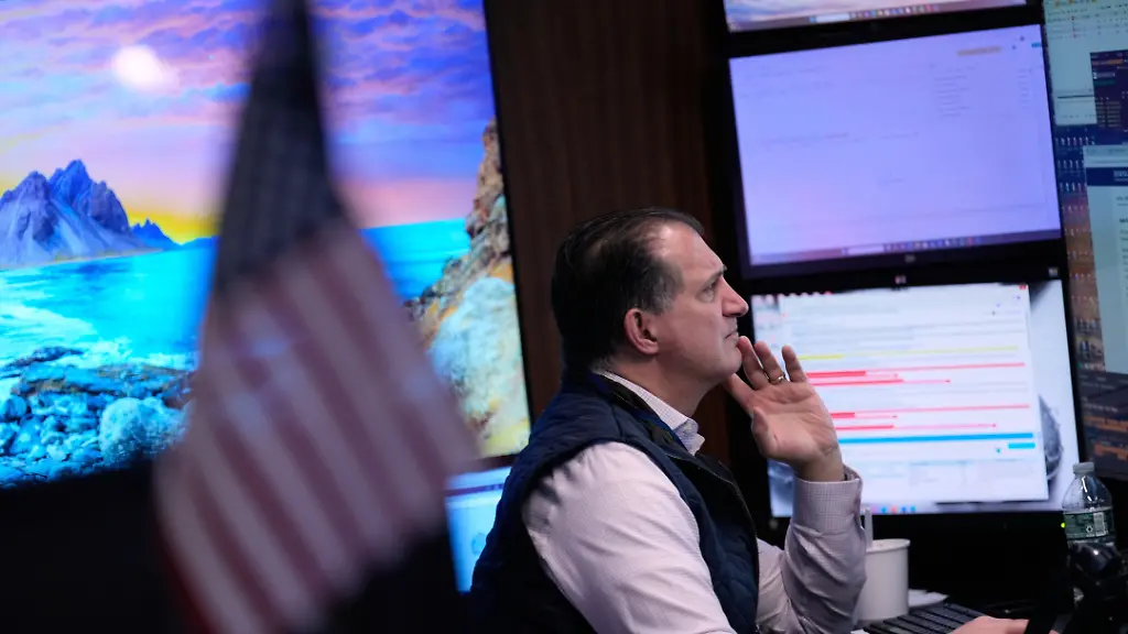 Traders-work-on-the-floor-at-the-New-York-Stock-Exchange-in-New-York-Tuesday-March-10-2026