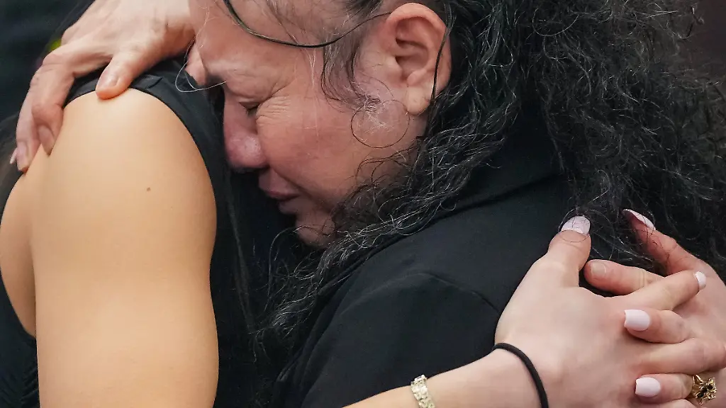 Carmen-Mejia-hugs-one-of-her-daughters-for-the-first-time-in-20-years-after-her-exoneration-hearing-in-Travis-County-s-460th-Criminal-District-Court-in-Austin-Texas-Monday-March-9-2026