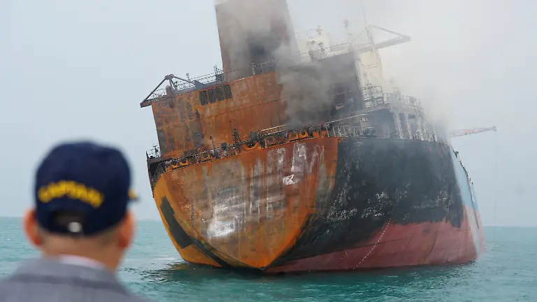A-foreign-tanker-carrying-Iraqi-fuel-oil-damaged-after-catching-fire-in-Iraq-s-territorial-waters-following-unidentified-attacks-that-targeted-two-foreign-tankers-according-to-Iraqi-port-officials-near-Basra-Iraq-March-12-2026