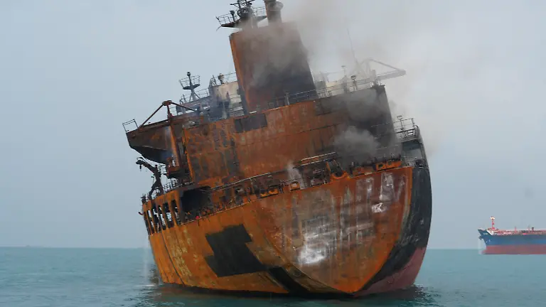 A-foreign-tanker-carrying-Iraqi-fuel-oil-damaged-after-catching-fire-in-Iraq-s-territorial-waters-following-unidentified-attacks-that-targeted-two-foreign-tankers-according-to-Iraqi-port-officials-near-Basra-Iraq-March-12-2026