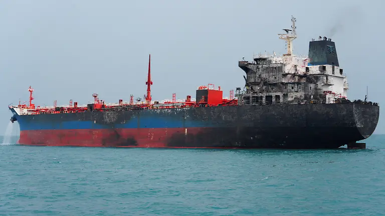 A-foreign-tanker-carrying-Iraqi-fuel-oil-damaged-after-catching-fire-in-Iraq-s-territorial-waters-following-unidentified-attacks-that-targeted-two-foreign-tankers-according-to-Iraqi-port-officials-near-Basra-Iraq-March-12-2026