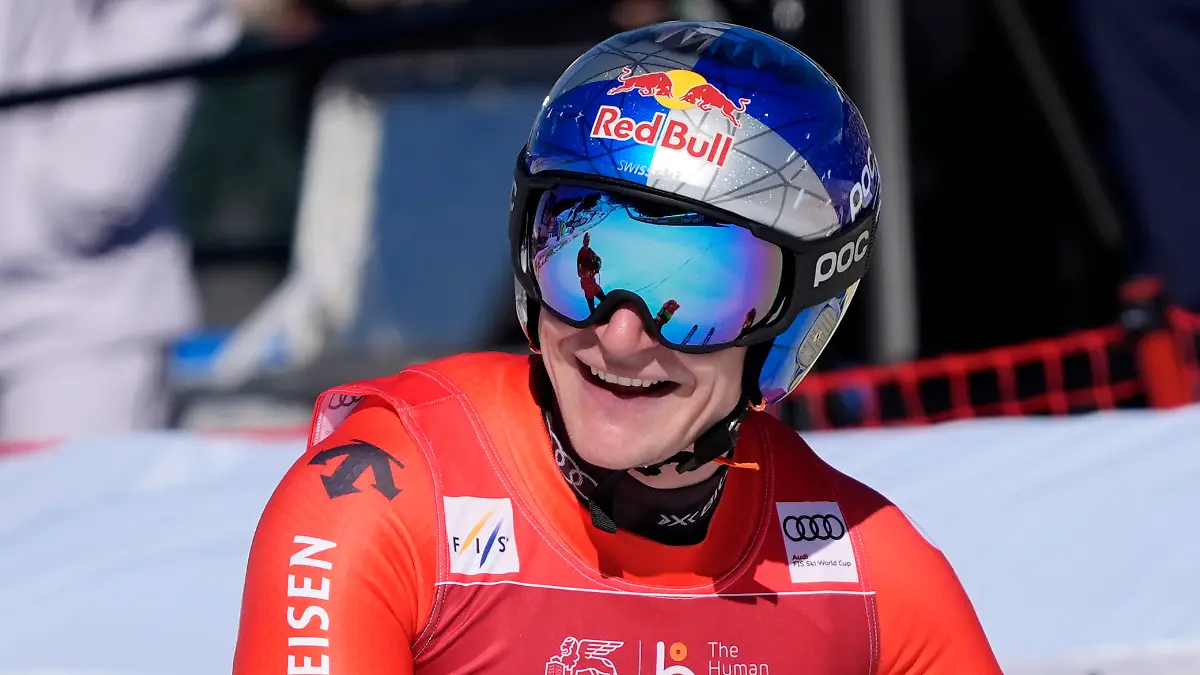 Switzerland-s-Marco-Odermatt-reacts-at-the-finish-area-of-an-alpine-ski-men-s-World-Cup-downhill-race-in-Courchevel-France-Friday-March-13-2026