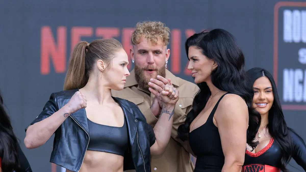 March-10-2026-Inglewood-California-USA-Ronda-Rousey-and-Gina-Carano-pose-with-Jake-Paul-center-after-a-Most-Valuable-Promotions-and-Netflix-news-conference-at-Intuit-Dome-in-Inglewood-California-on-Tuesday-March-10-2026-promoting-their-upcoming-fight-scheduled-for-May-16-2026-JAVIER-ROJAS-PI-Rousey-Vs