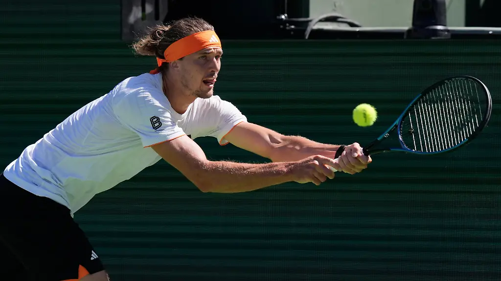 Alexander-Zverev-of-Germany-returns-a-shot-against-Jannik-Sinner-of-Italy-during-a-semifinal-match-at-the-BNP-Paribas-Open-tennis-tournament-Saturday-March-14-2026-in-Indian-Wells-Calif-AP-Photo-Mark-J