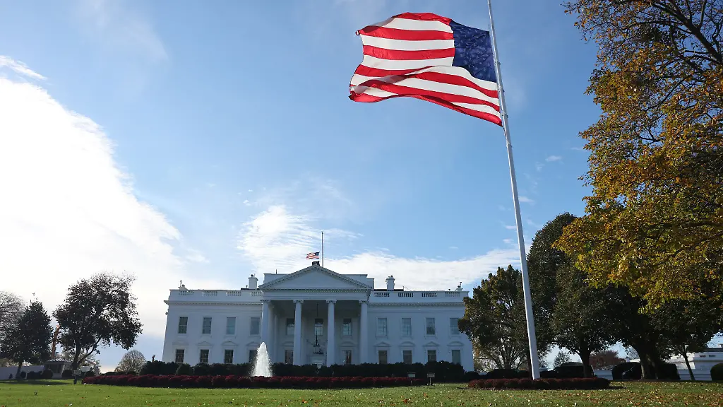 A-large-American-flag-flies-on-the-north-lawn-of-the-White-House-in-Washington-D-C-U-S-November-11-2025