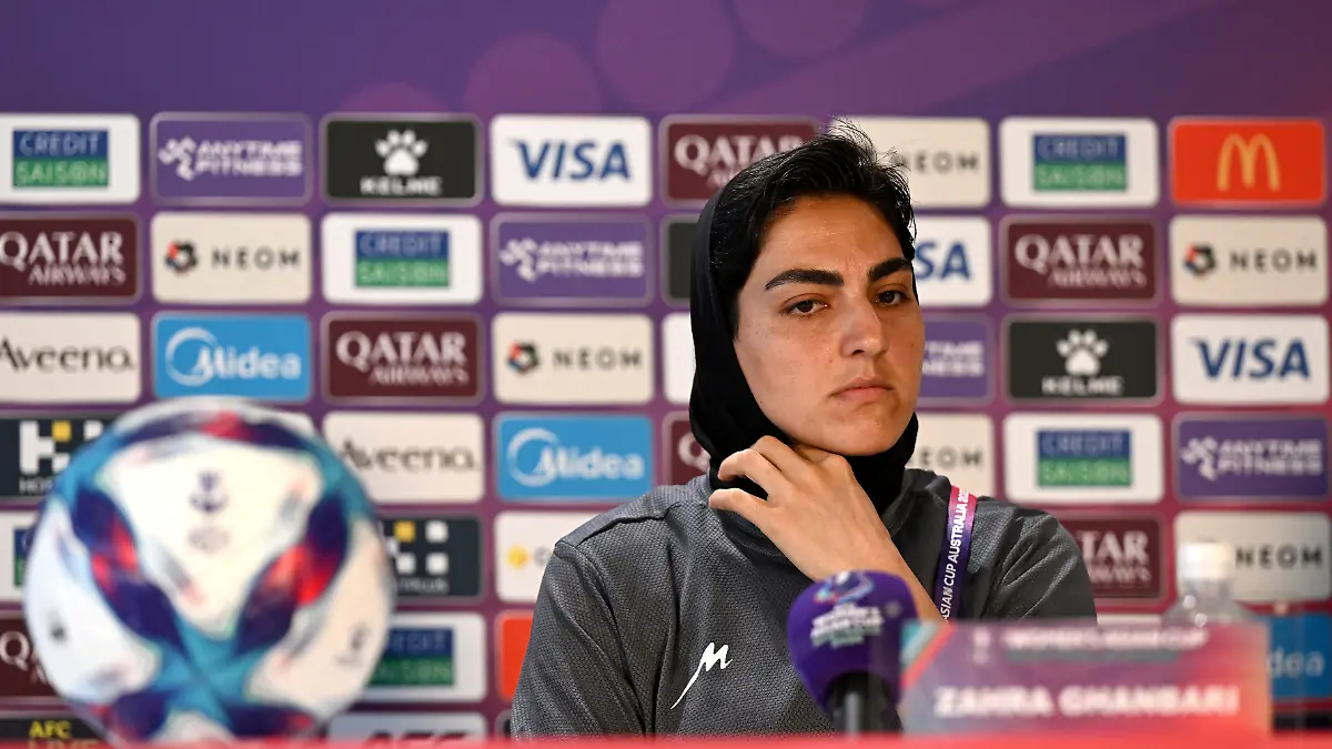 Iranian-women-s-national-soccer-team-captain-Zahra-Ghanbari-reacts-during-a-press-conference-for-the-Women-s-Asian-Cup-at-Robina-Stadium-on-the-Gold-Coast-Australia-March-1-2026-Dave-Hunt-AAP-via-REUTERS-ATTENTION-EDITORS-THIS-IMAGE-WAS-PROVIDED-BY-A-THIRD-PARTY-NO-RESALES-NO-ARCHIVE-AUSTRALIA-OUT-NEW-ZEALAND-OUT-NO-COMMERCIAL-OR-EDITORIAL-SALES-IN-NEW-ZEALAND-NO-COMMERCIAL-OR-EDITORIAL-SALES-IN-AUSTRALIA