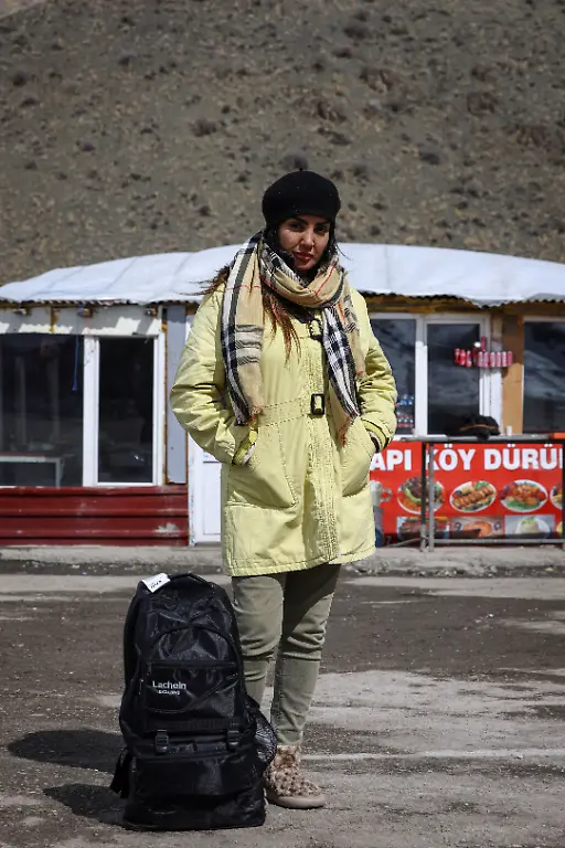 Leila-45-from-Shiraz-Iran-poses-for-a-portrait-ahead-of-crossing-from-Turkey-into-Iran-in-Van-province-Turkey-March-6-2026-Leila-had-been-staying-in-Istanbul-where-she-occasionally-assists-academics-connected-with-a-German-historical-research-institution-But-after-losing-contact-with-her-family-in-Shiraz-she-decided-she-had-to-return-home-REUTERS-Dilara-Senkaya-SEARCH-SENKAYA-IRAN-CRISIS-TURKEY-BORDER-FOR-THIS-STORY-SEARCH-WIDER-IMAGE-FOR-ALL-STORIES