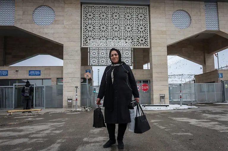 Yasna-63-from-Iran-poses-for-a-portrait-near-the-Kapikoy-border-gate-after-arriving-in-Turkey-in-Van-province-Turkey-March-5-2026-I-came-to-see-my-daughter-I-haven-t-seen-her-for-six-years-Yasna-said-She-was-reluctant-to-comment-on-the-political-situation-in-Iran-I-don-t-know-what-to-say-about-the-situation-in-Iran-because-we-will-be-going-back-to-Iran-REUTERS-Dilara-Senkaya-SEARCH-SENKAYA-IRAN-CRISIS-TURKEY-BORDER-FOR-THIS-STORY-SEARCH-WIDER-IMAGE-FOR-ALL-STORIES