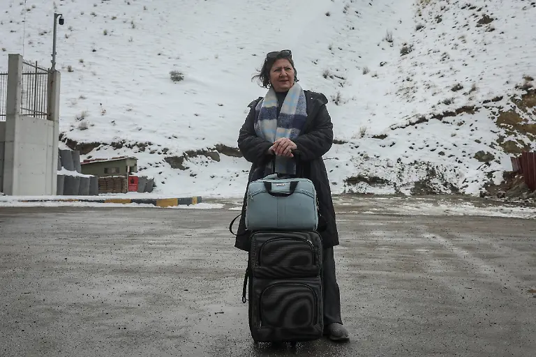 Jalileh-Jabari-63-from-Tehran-Iran-poses-for-a-portrait-after-arriving-in-Turkey-in-Van-province-Turkey-on-her-way-to-Istanbul-to-join-her-daughter-March-5-2026-Jabari-said-she-left-Tehran-because-bombs-are-falling-and-the-situation-had-become-unbearable-If-things-become-good-there-if-Iran-becomes-good-I-will-come-back-If-there-is-peace-I-will-return-REUTERS-Dilara-Senkaya-SEARCH-SENKAYA-IRAN-CRISIS-TURKEY-BORDER-FOR-THIS-STORY-SEARCH-WIDER-IMAGE-FOR-ALL-STORIES