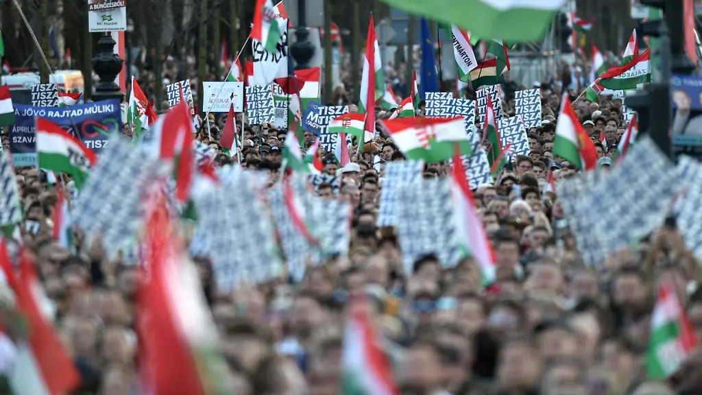 People-gather-at-a-rally-for-the-Tisza-Party-as-Peter-Magyar-a-prime-ministerial-candidate-of-Hungary-speaks-in-Budapest-Hungary-on-March-15-on-the-anniversary-of-the-1848-49-Hungarian-Revolution-Rallies-from-all-major-parties-are-scheduled-for-today-marking-one-of-the-most-important-days-of-the-election-campaign-as-Hungary-is-set-to-hold-a-general-election-in-April