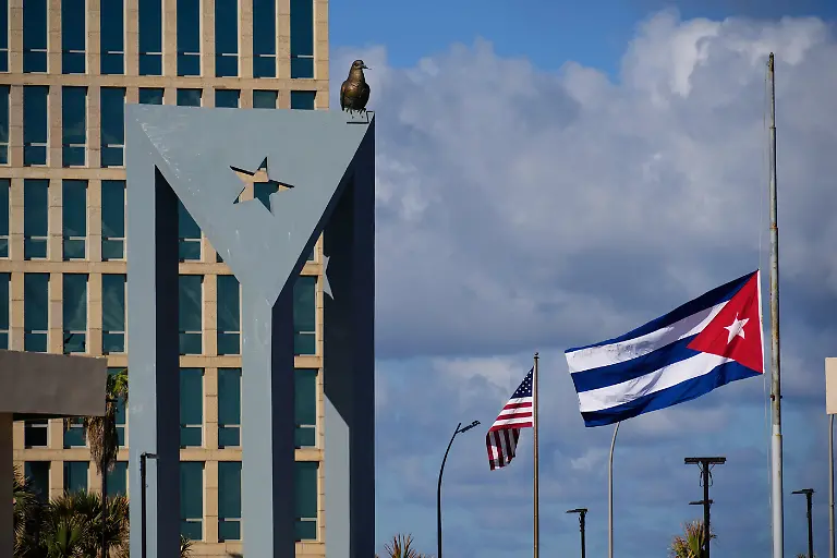 The-Cuban-flag-flies-at-half-mast-at-the-Anti-Imperialist-Tribune-near-the-U-S-embassy-in-Havana-Cuba-Monday-Jan-5-2026-in-memory-of-Cubans-who-died-two-days-before-in-Caracas-Venezuela-during-the-capture-of-Venezuelan-President-Nicolas-Maduro-by-U-S-forces