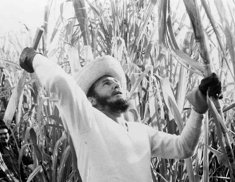 FILE-In-this-Feb-13-1961-file-photo-Prime-Minister-Fidel-Castro-cuts-cane-with-thousands-of-other-volunteer-workers-in-Cuba-For-half-a-century-Castro-seemed-to-be-everywhere-in-Cuba-inspecting-factories-farms-and-offices-expounding-to-the-press-and-zooming-to-the-scenes-of-natural-disasters-to-direct-the-minutest-details-of-the-response