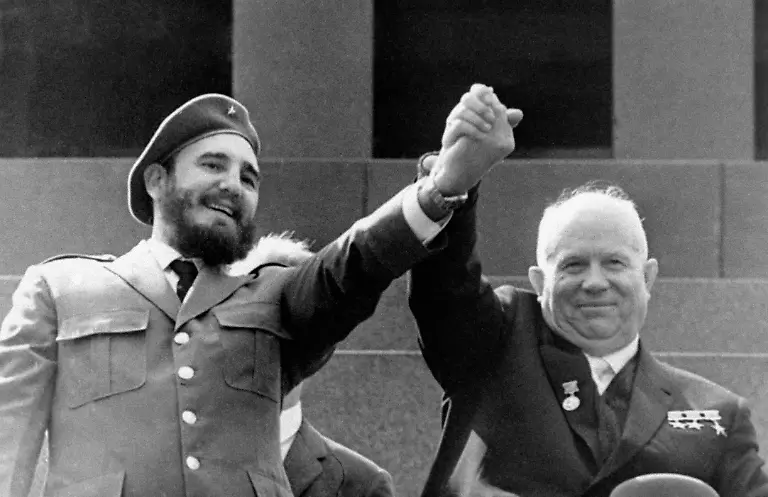 FILE-Cuba-s-leader-Fidel-Castro-left-and-Nikita-Khrushchev-Soviet-premier-and-the-First-Secretary-of-the-Communist-Party-of-the-Soviet-Union-clasp-hands-at-the-Lenin-mausoleum-in-Moscow-s-Red-Square-on-May-Day-in-Moscow-Russia-in-May-1-1963-Many-observers-say-the-closest-that-the-world-has-come-to-full-nuclear-war-was-in-the-1962-confrontation-between-the-United-States-and-the-USSR-over-the-presence-in-Cuba-of-Soviet-nuclear-missiles-which-Khrushchev-sent-in-response-to-the-US-placing-nuclear-capable-missiles-in-Turkey